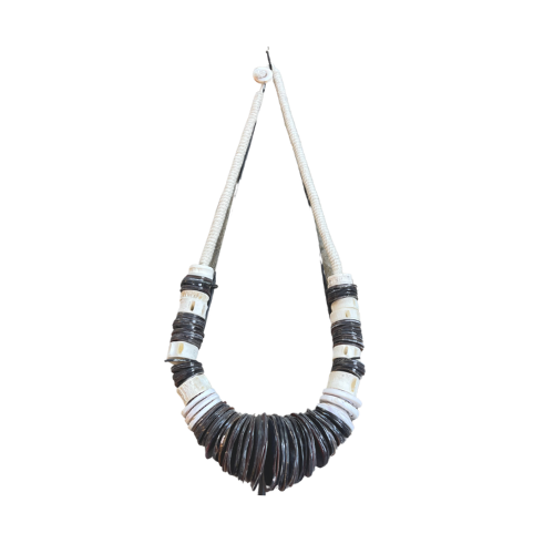 BLACK AND WHITE TRIBAL PEACE NECKLACE ON STAND