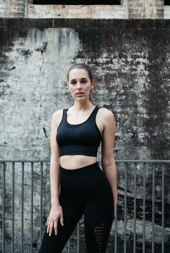 seamless black 7/8ths leggings with laser cut detail at the calf by Gerry Can