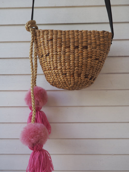 Woven Straw Girls Bag - Pink Pom Pom Detail.